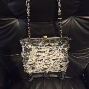 Elegant Faux Fur Clutch with Embroidered Accents